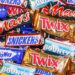 stuttgart-germany-november-7-2023-products-of-mars-inc-company-like-snickers-twix-milky-way-and-bounty-chocolate-bars-background-in-stuttgart-2WWAXTY